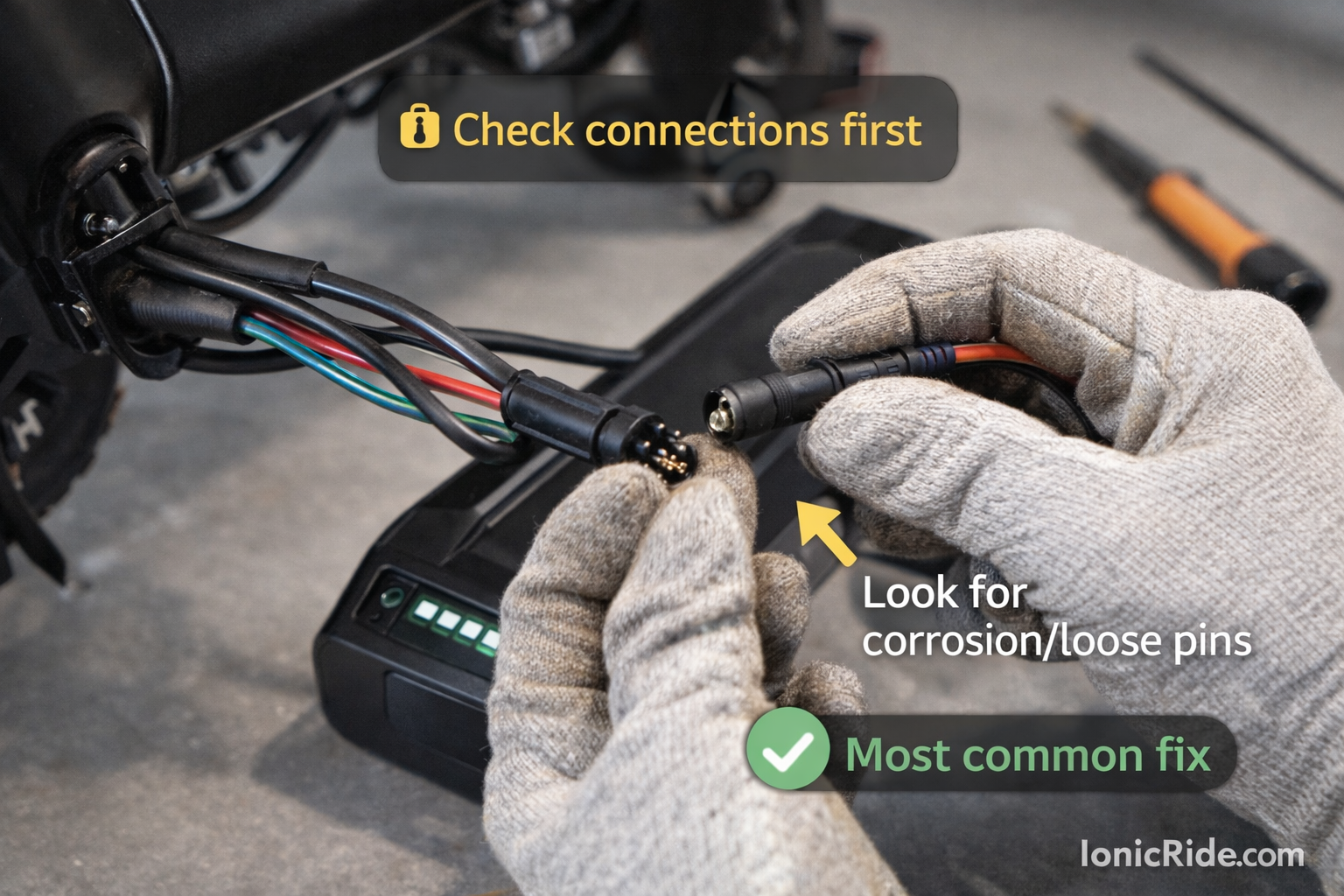 Digital multimeter checking e-bike battery voltage reading 42.3V - diagnostic test for E06 and E09 battery error codes