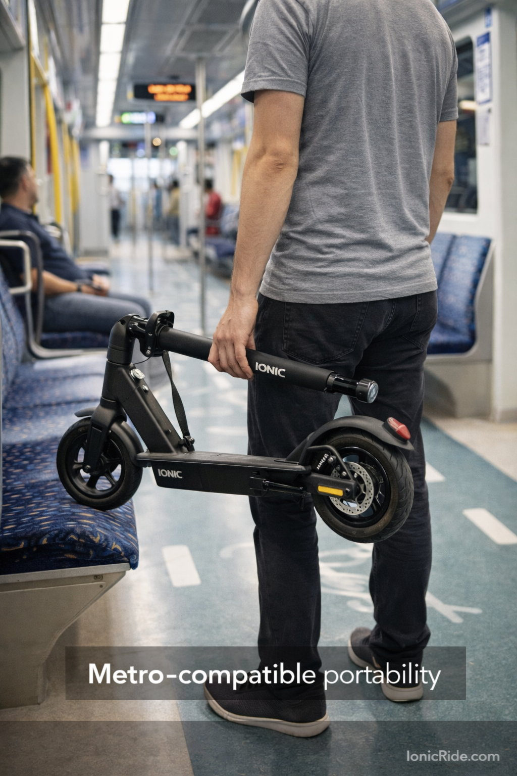 Person carrying folded e-scooter on Dubai Metro during off-peak hours showing multimodal transport compatibility