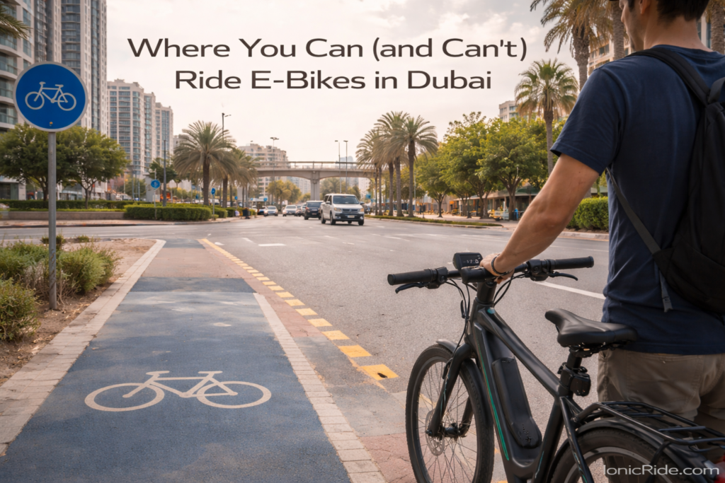 E-bike paused where a dedicated cycling path ends and a regular road begins in Dubai, illustrating where riding rules and planning matter