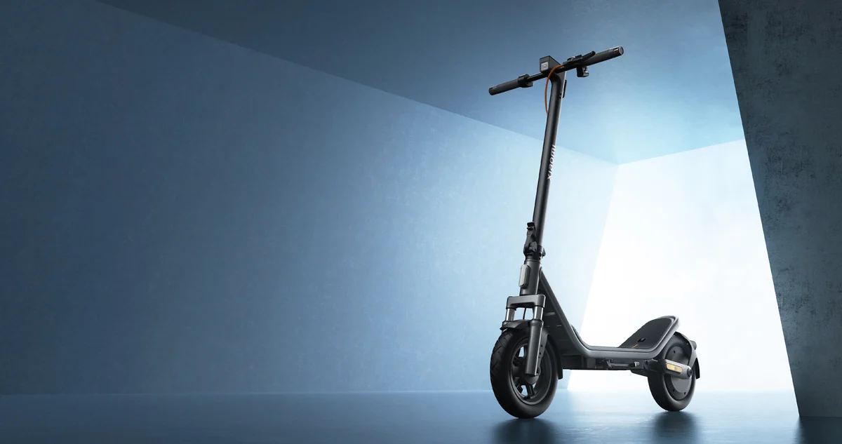 Xiaomi Electric Scooter 6 shown in a blue studio setting